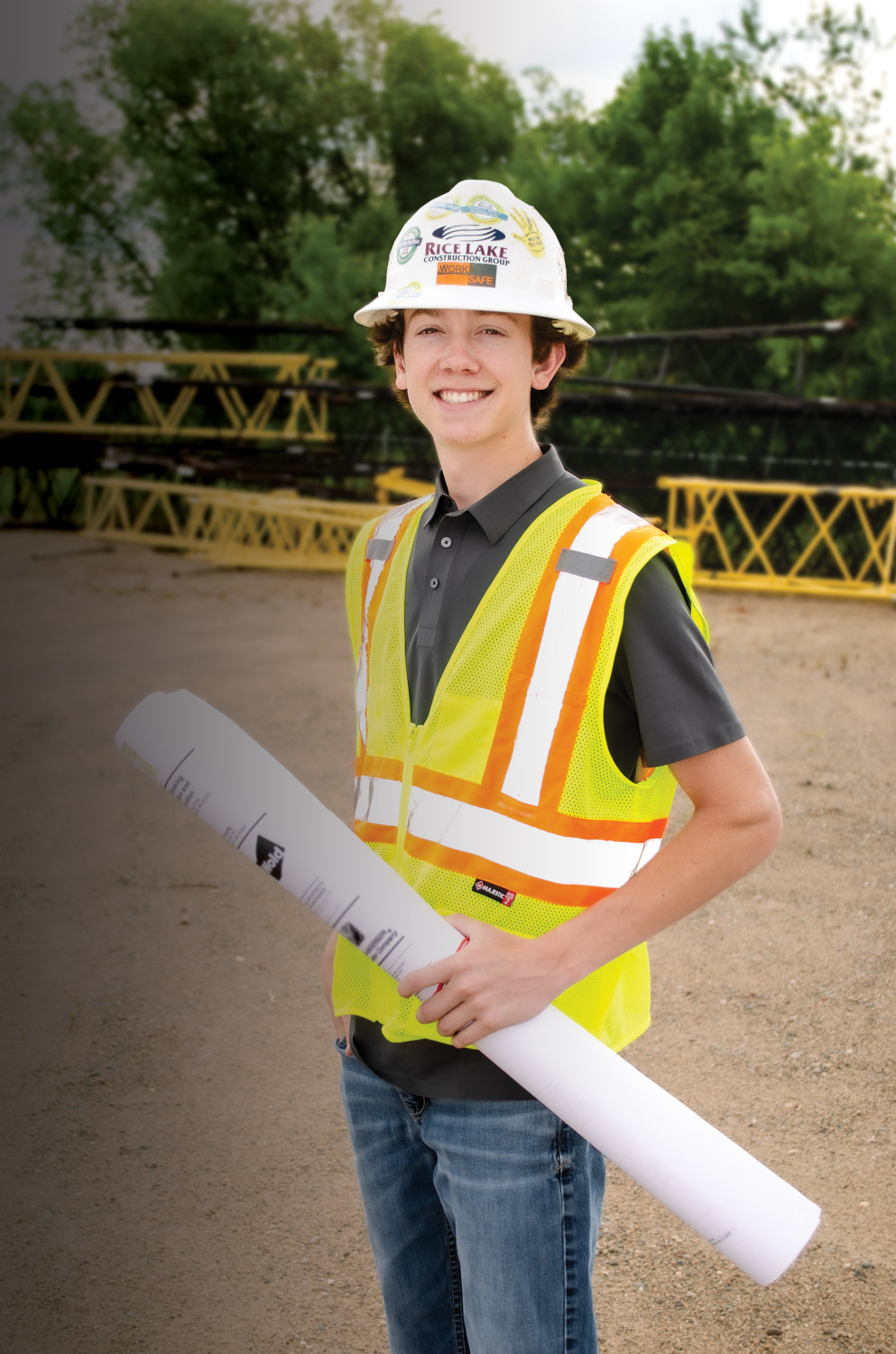 WRG Intern John holding plans